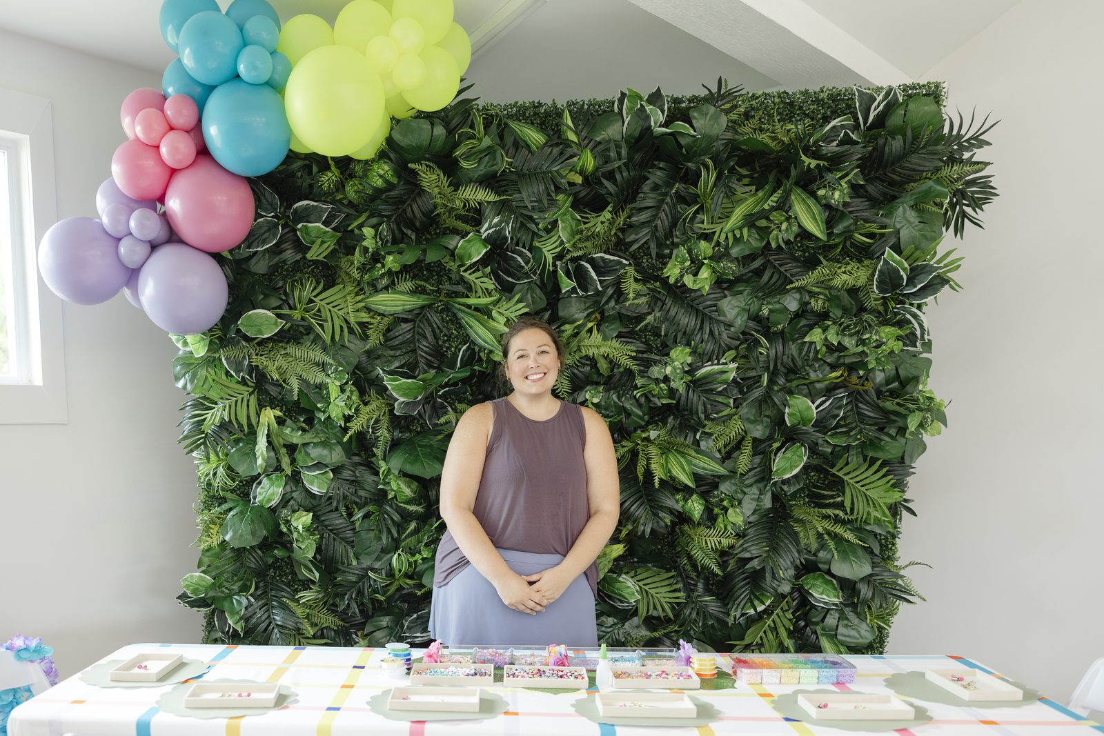 A PlayLab Co. host running a guided Premium Experience station